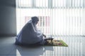 Old muslim woman reading quran Royalty Free Stock Photo