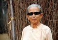 Old Myanmar woman wearing shades