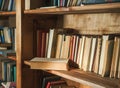 Old, Nameless Book For Sale In Brown Wooden Library, With Blurred Background Adding Timeless And Classical Touch To
