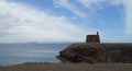 Old Napolionic Fort on cliff top at Playa Blanca Lanzarote Spain. Royalty Free Stock Photo