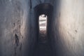 Old narrow arched corridor between buildings in old town of Szentendre, Hungary