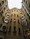 an old narrow courtyard-well in the historical center of the city