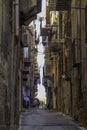 An old narrow and deserted street in the old downtown historic district of Palermo, Sicily