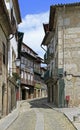 Old narrow street in portuguese city Guimaraes Royalty Free Stock Photo