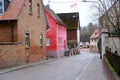 Old narrow street of the European city of Frankfurt, Bonames district, colorful houses, road, concept of history of architecture,