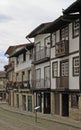 Old narrow street in portuguese city Guimaraes Royalty Free Stock Photo