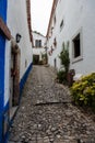 Old Narrow Street in Portuguese Town of Obidos Royalty Free Stock Photo