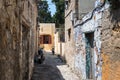 Old narrow street of Rhodes town on Rhodes island, Greece Royalty Free Stock Photo