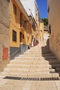 Old Narrow Street and Stairs Sidewalk in Biar Alicante Spain .