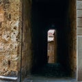 The old narrow streets in the medieval town of Massa Marittima in Tuscany shot with analogue film technique - 6 Royalty Free Stock Photo