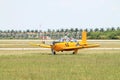 Old Navy plane lands on field Royalty Free Stock Photo