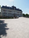 Old neo baroque castle museum and courtyard at park of european Pszczyna city in Poland - vertical Royalty Free Stock Photo