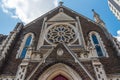 Old neo-gothic church with a broken steeple at the facade through earth quake, Auckland