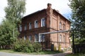 Old neogothic living building with red brick walls in Red Army street of Ryazhsk in Ryazan region, Russia.