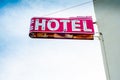 Old neon hotel sign on a wall Royalty Free Stock Photo