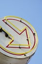 Old Neon Painted Arrow on Tall Metal Pole