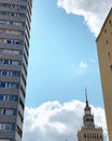 old and new, ancient and modern architecture, skyscrapers, windows in a block of flats, clouds Royalty Free Stock Photo