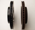 Old and new brake discs. Selective focus. Royalty Free Stock Photo