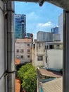 Old and New buildings in HCMC Vietnam