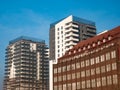 Old and new buildings next to each other. Royalty Free Stock Photo