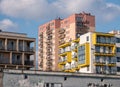 Old and new generic real estate, block of flats, multiple buildings from different times, eastern Europe, European residential