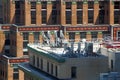 Old and new high-rise buildings in Midtown, architectural details, rooftop communications equipment, New York, NY Royalty Free Stock Photo