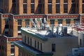 Old and new high-rise buildings in Midtown, architectural details, rooftop communications equipment, New York, NY Royalty Free Stock Photo