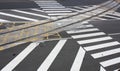 Road marking.Train rails and pedestrian crossing