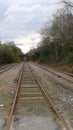 Old and new train tracks railroad overpass bridge distance Royalty Free Stock Photo