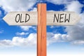 Old or new - wooden signpost Royalty Free Stock Photo