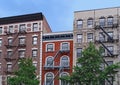 Old New York apartment building with external fire escapes, Royalty Free Stock Photo