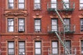 Old New York apartment building with fancy terra cotta detailing