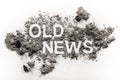 Old news word text written in ash, dust or dirt Royalty Free Stock Photo
