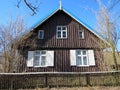 Old wooden home with fence, Lithuania