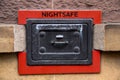 Old Night Safe on a Sandstone Wall