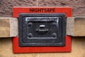 Old Night Safe on a Sandstone Wall Royalty Free Stock Photo