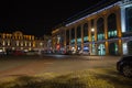 Old night space in Kutaisi, Georgia. City night plaza in autumn with paths strewn Royalty Free Stock Photo