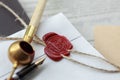 Old notarial wax seal on tied scroll, closeup Royalty Free Stock Photo