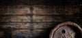 Old oak beer barrel on an old wooden wall banner Royalty Free Stock Photo