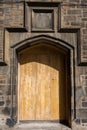 Old oak door in a stone doorway in Edinburgh Scotland Royalty Free Stock Photo