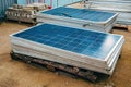 Old obsolete solar panels in factory yard Royalty Free Stock Photo