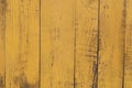 Obsolete yellow painted wooden background texture