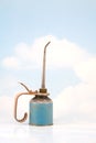 Old Oil Can on Sky Background Royalty Free Stock Photo