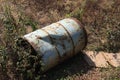 Old Oil Drum/Barrel left damaged on the ground