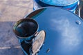 Old oil funnel on rusty metal oil barrels at shipyard.Phuket.Thailand