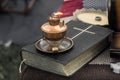 Old oil lamp on a bible blurry background Royalty Free Stock Photo