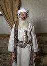 Old omani man with a hunting rifle