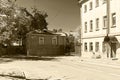 An old one-story house with a sign `Metal repair`