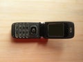 Old open black flip phone Royalty Free Stock Photo