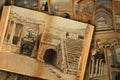 Old open book. Image of ruins and columns in ancient Roman city. Bet She`an National Park, Israel. Old paper textured pages.